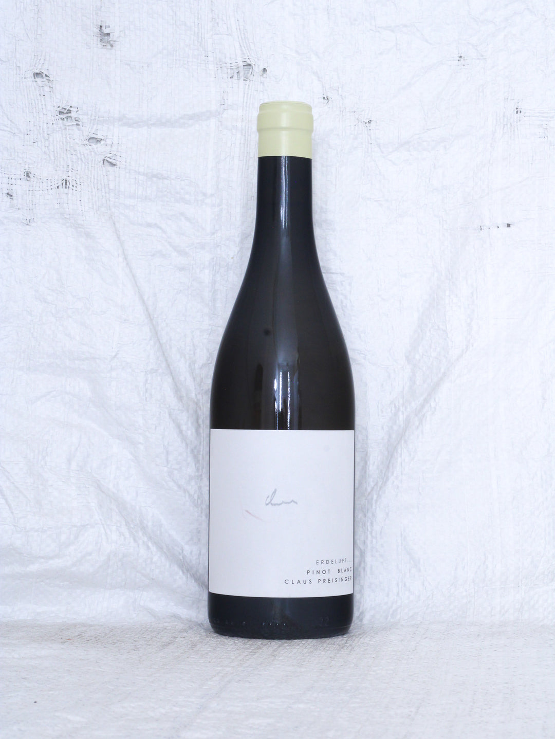 Pinot Blanc ErdeLuftGras 2025 von Claus Preisinger aus Gols im Burgenland – biodynamischer Bio Weißwein, Vorderansicht der Weinflasche.