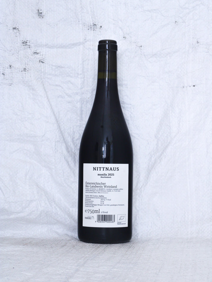 Rücketikett des Manila Blaufränkisch 2025 Bio von Martin, Andreas & Lydia Nittnaus aus dem Burgenland