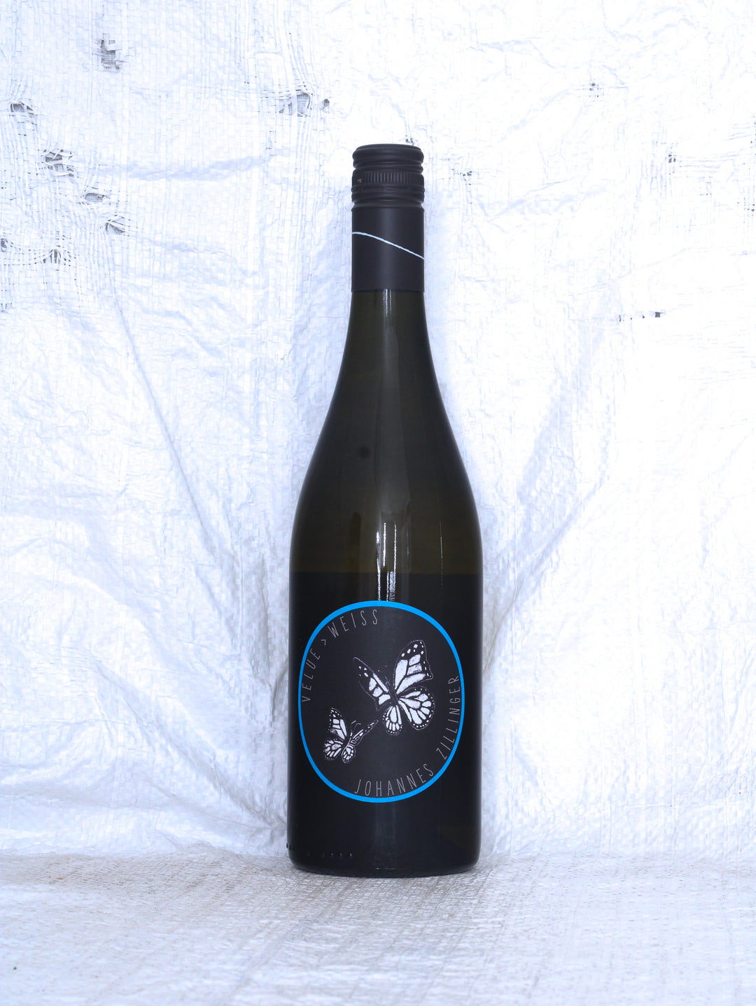 Velue Weiß 2025 von Johannes Zillinger aus dem Weinviertel – Bio Naturwein aus Riesling, Grüner Veltliner und Gelbem Muskateller, Vorderansicht der Weinflasche.